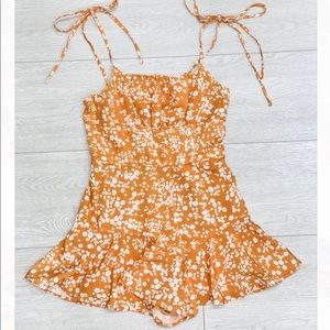 Orange floral romper